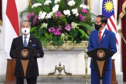 Bertemu Jokowi, PM Muhyuddin sebut Malaysia akan pastikan perlindungan TKI