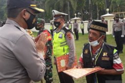 Inilah sosok Heri Bambang, penyandang disabilitas dari Tabir pengatur lalu lintas di Jalinsum