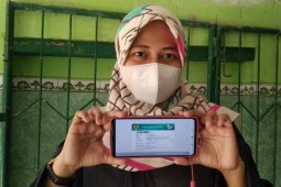 Mobile JKN Mudahkan Langkah Dziroh Akses Pelayanan Saat Pandemi