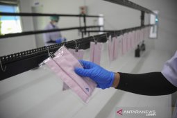 Produksi masker Ateja