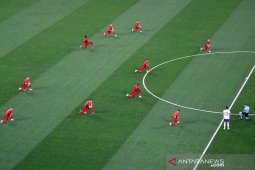 Cemoohan bergema saat Belgia berlutut jelang laga lawan Rusia