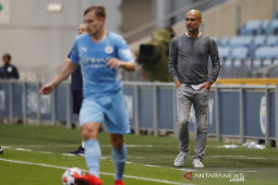 Guardiola berharap pemain City bisa  langsung berlatih tanpa karantina