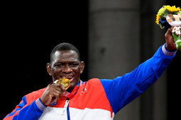 Olimpiade Tokyo 2020:  Kisah si raja gulat mengukir sejarah besar di Tokyo