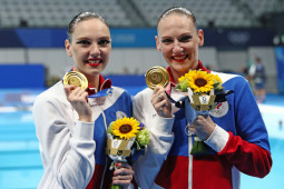 Olimpiade Tokyo, Romashina sabet emas Olimpiade keenam, catatkan sejarah renang indah