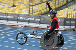 Jaenal Aripin  gagal tembus final 100 meter