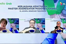 Tingkatkan layanan, XL Axiata jalin kemitraan dengan Grab dan Tokopedia