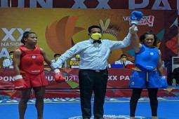 Momen Melisa memenangkan pertandingan final wushu PON