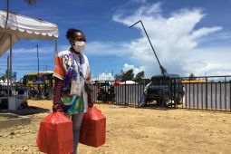 Tangan-tangan kecil penggerak  PON Papua