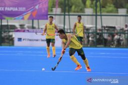 PON Papua- Kaltim dan Papua  berbagi emas di hoki lapangan