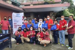 Rayakan Natal, WOM Finance bagikan kado Natal kepada anak disabilitas