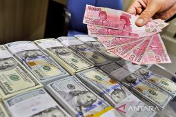Rupiah menguat seiring pasar nantikan hasil pertemuan bank sentral AS