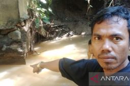 Pondasi  jembatan mengancam, masyarakat Simataniari normalisasi Sungai Sangkunur