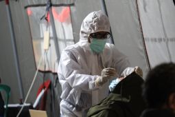 Menanti percaya diri Indonesia umumkan endemi