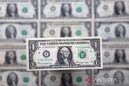 Dolar Senin pagi menuju kerugian bulanan