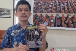Sejarah foto dan kantor berita di balik "Linimasa" Audy Mirza