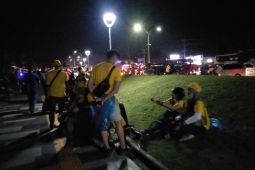 Sejumlah penonton MotoGP  pulang jalan kaki sampai area parkir