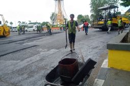 Aspal kawasan Tugu Keris sekarang hitam mengkilat