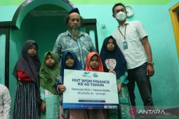 Penyerahan Bantuan CSR WOM FInance