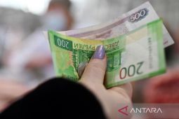 Rubel menguat tembus angka 59