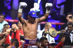 Daud Yordan pertahankan gelar menang TKO atas Panya Uthok