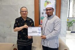 Bank Kalsel serahkan bantuan pengembangan metode tartily banjary