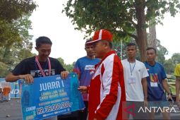 "Ratu Lari" Odekta Naibaho dan Robby Sianturi juarai "10K Candi Muaro Jambi 2022"