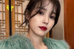 IU akan tampil di drama terbaru berjudul "My Mister"