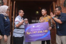 Jelang tutup tahun, AXA Mandiri bayarkan klaim nasabah Nganjuk senilai Rp1 Miliar