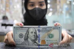 Rupiah menguat seiring pemotongan suku bunga The Fed