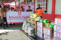 Alfamidi bantu korban bencana Manado