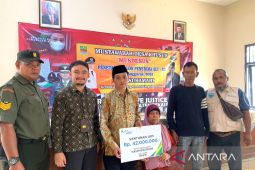 Anggota Satlinmas Bekasi terima santunan kematian dari BPJAMSOSTEK