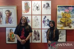 Pasutri Budi Bi-Ami Tri pamerkan lukisan "kasih sayang" di Surabaya