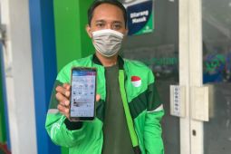 Kisah pengemudi ojek daring yang merasakan manfaat BPJS Kesehatan