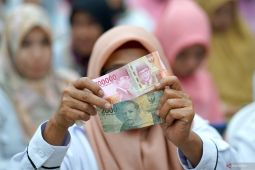 Rabu hari ini rupiah turun jadi Rp15.033 per dolar AS