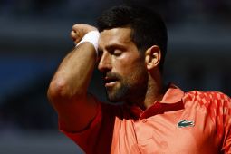 Novak Djokovic harus menyesuaikan diri dengan cedera di French Open