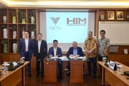Neta bersama HIM rakit kendaraan listrik di Indonesia