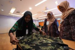 Sepotong baju mengantarkan empat siswi SMKN ke Istana Negara