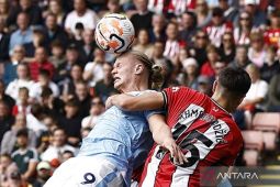 Man City naik ke puncak klasemen setelah tundukkan Sheffield 2-1