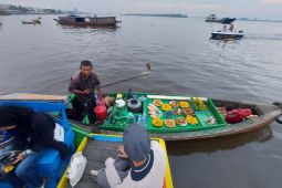 Pasar Terapung Kuin Sungai Barito, antara migrasi dan praktik kebaikan