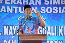 Plt Bupati Langkat bagikan PBI JKN