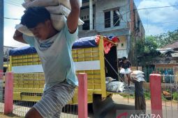 Aroma harum nasi yang menyebar dari panci keluarga penerima manfaat