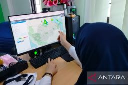 Sebagian wilayah Kota Jambi diguyur hujan kurangi asap