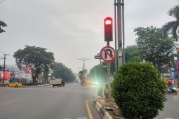 Hujan deras belum enyahkan kabut asap di Banjarmasin