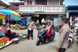 Polda Maluku sampaikan seruan Kamtibmas di Pasar Rumah Tiga Ambon
