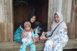 Rinah kader stunting dari Desa Halong