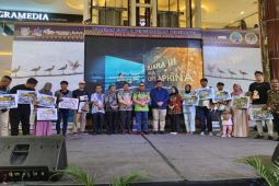 Lomba foto dan konten kreator burung migran di Taman Tasional Sembilang Banyuasin
