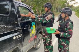 Satgas Pamtas Indonesia-PNG berbagi kasih di bulan Ramadhan