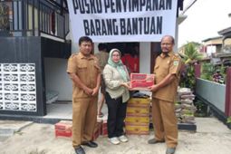 Masyarakat Pasar Bodok Parindu terima bantuan sembako dari PTPN IV Regional V