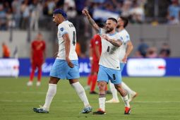 Uruguay menuju perempat final setelah pesta gol 5-0 lawan Bolivia