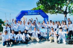 Peserta QRIS Jelajah Indonesia 2024 Bali kampanye di lokasi wisata